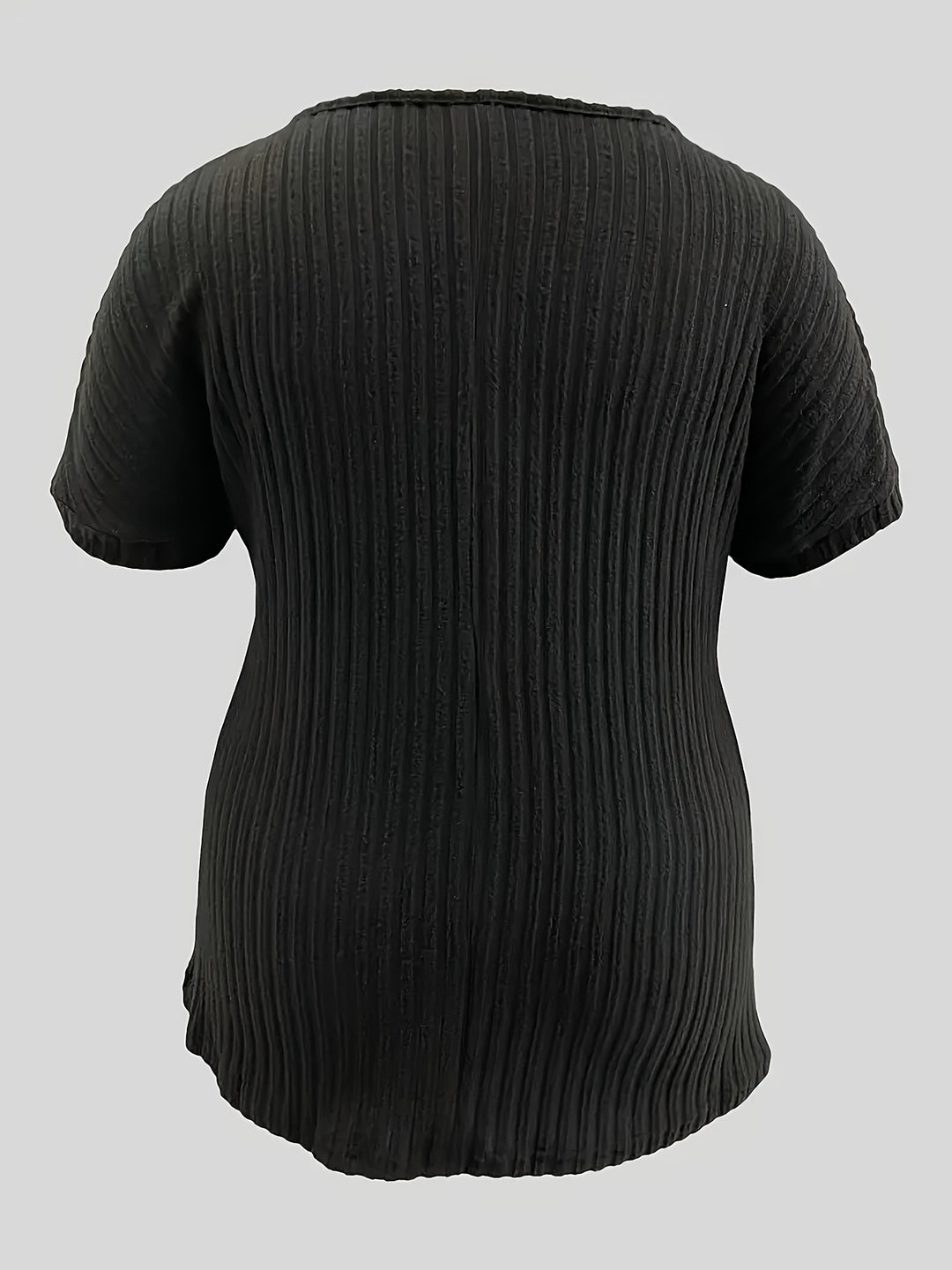 Gebreide top - V-hals en decoratieve knoopdetails