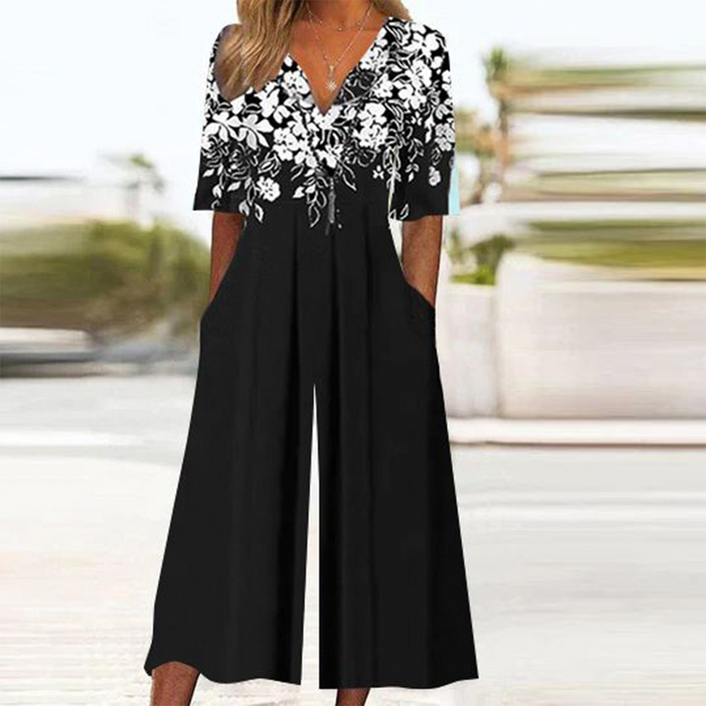 Mandy - Zwarte gebloemde jumpsuit met halve mouwen