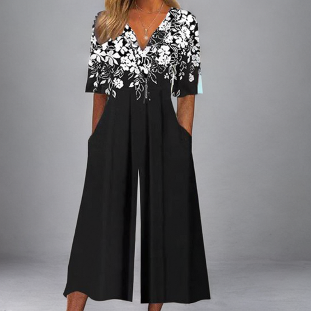 Mandy - Zwarte gebloemde jumpsuit met halve mouwen