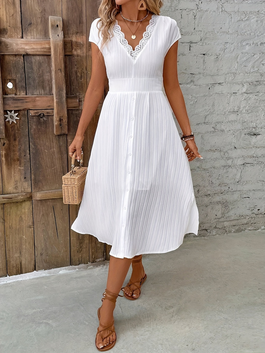 Midi Jurk – V-Hals & Geribbelde Taille