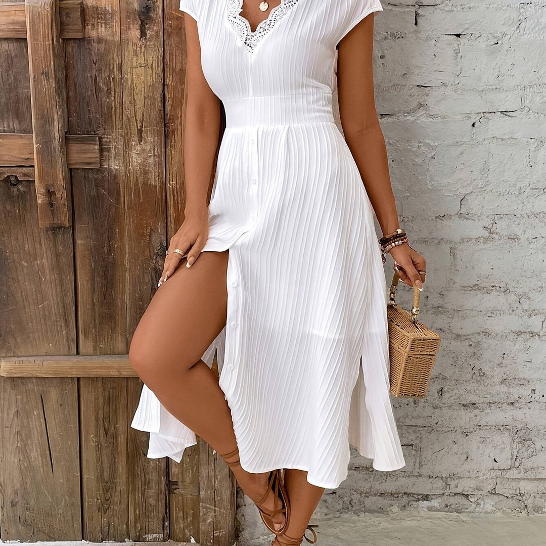 Midi Jurk – V-Hals & Geribbelde Taille